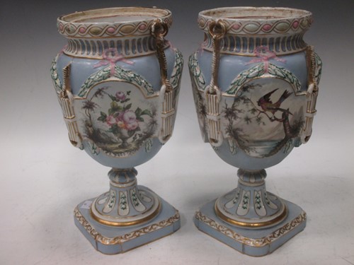 Lot 11 - A pair of Continental porcelain pale blue...