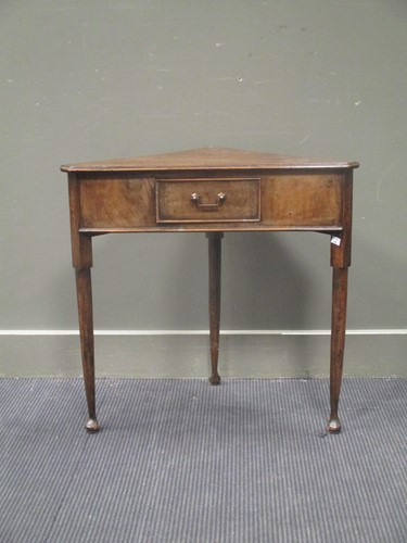 Lot 430 - A mahogany corner table with triangular top...