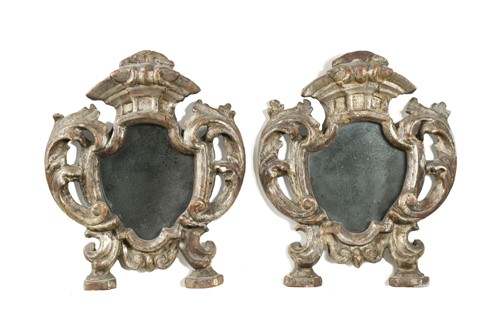 Lot 212 - A pair of small Venetian carved and silvered wood wall mirrors, 18th century