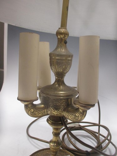 Lot 120 - An engraved lacquered-brass four-branch...