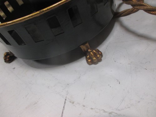 Lot 120 - An engraved lacquered-brass four-branch...