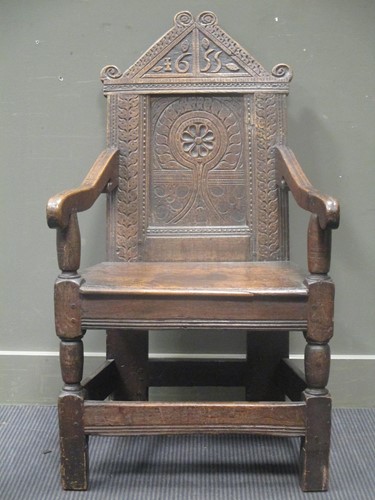 Lot 512 - A mid 17th century style Wainscot armchair