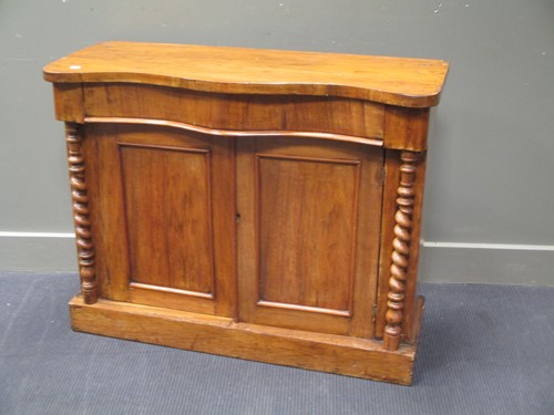 Lot 672 - A Victorian walnut veneered serpentine...
