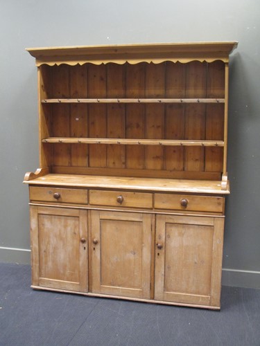 Lot 847 - A Victorian and later pine dresser, with...