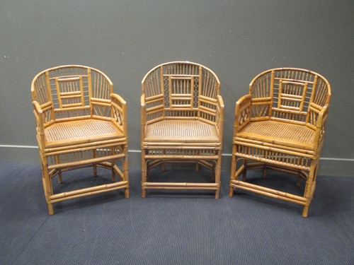 Lot 853 - A set of three Chinese bamboo armchairs, with...