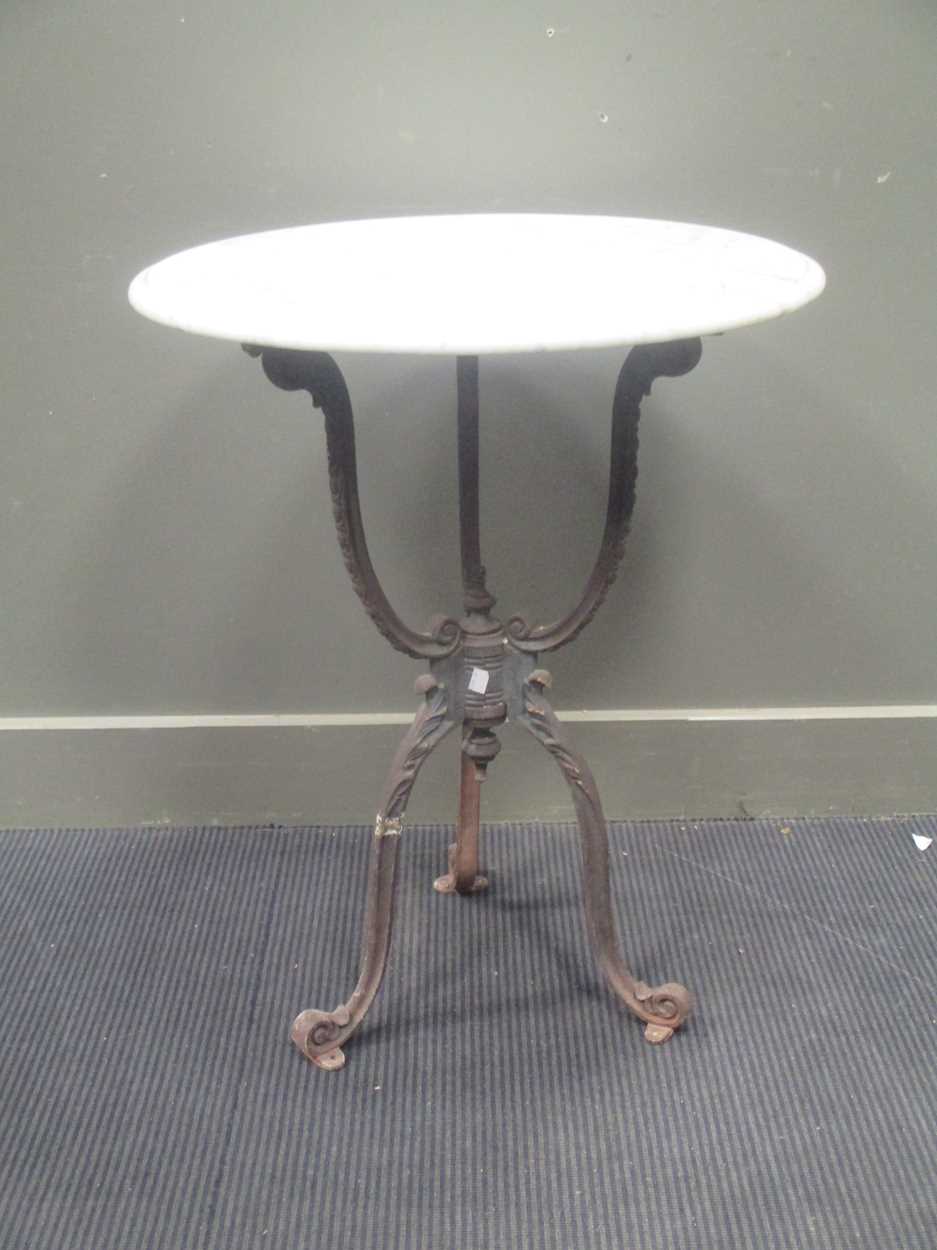 Lot 747 - A Victorian style cast iron base garden table...