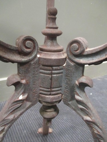 Lot 747 - A Victorian style cast iron base garden table...