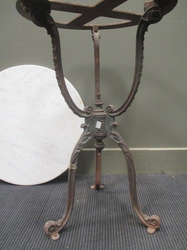 Lot 747 - A Victorian style cast iron base garden table...