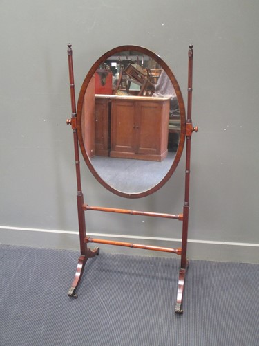 Lot 571 - A Regency style ring turned mahogany frame...