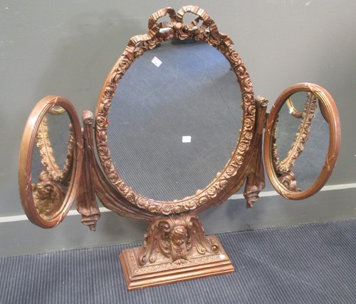 Lot 702 - An Edwardian gilt gesso oval dressing table...