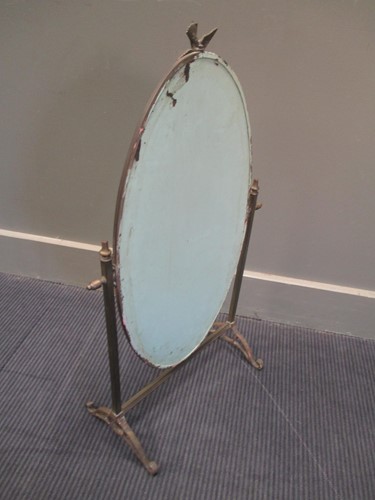 Lot 691 - A brass framed oval dressing table mirror,...