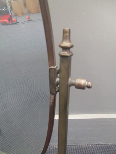 Lot 691 - A brass framed oval dressing table mirror,...
