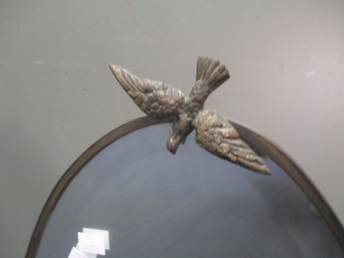 Lot 691 - A brass framed oval dressing table mirror,...