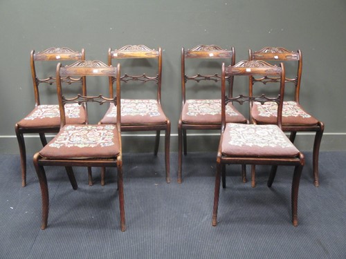 Lot 722 - A set of six Regency faux rosewood dining...