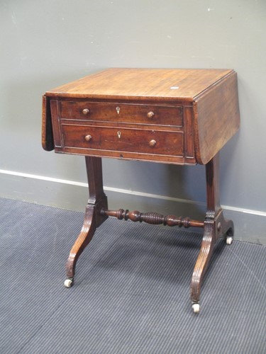 Lot 727 - A Regency mahogany work table, the frieze...