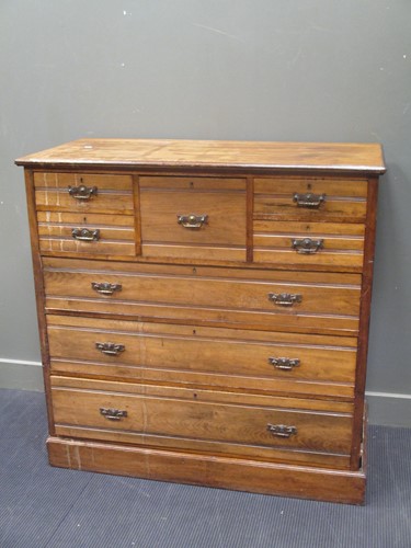 Lot 681 - An Edwardian stained wood chest of drawers...