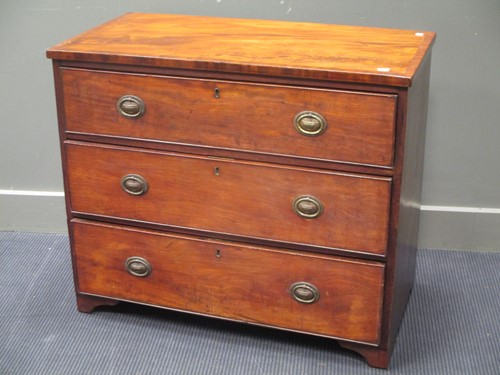 Lot 738 - A George III mahogany small chest of three...