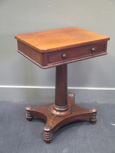 Lot 785 - A 19th century mahogany lamp table with single...