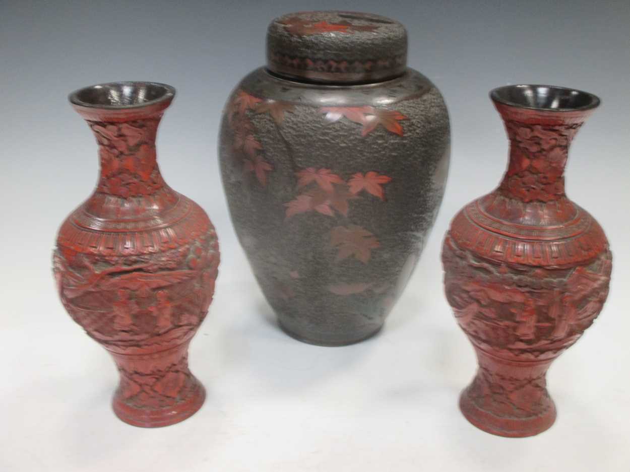 Lot 287 - A pair of cinnabar lacquer vases and a lacquer...