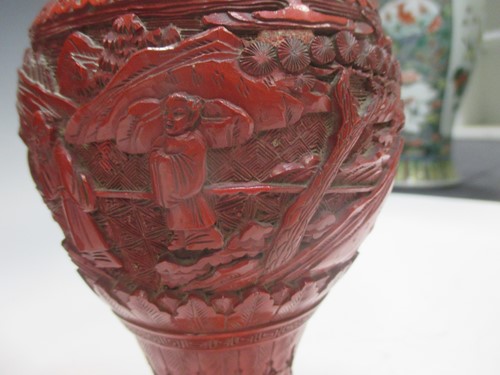 Lot 287 - A pair of cinnabar lacquer vases and a lacquer...