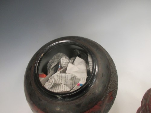 Lot 287 - A pair of cinnabar lacquer vases and a lacquer...