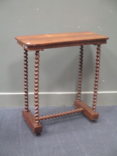 Lot 780 - A mahogany side table on barley twist supports...