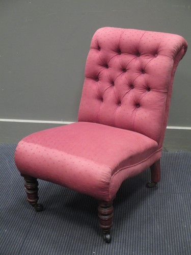 Lot 754 - A small button back chair on turned legs 70 x...