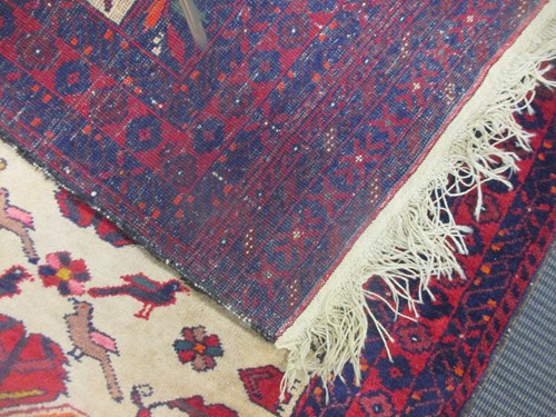 Lot 900 - A Beluchi style runner, modern 310 x 79cm