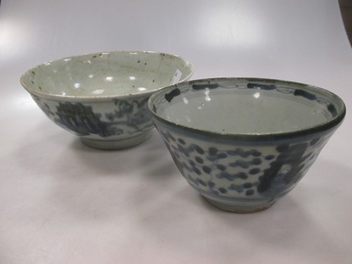 Lot 232 - Two rustic 'Ming' blue and white bowls