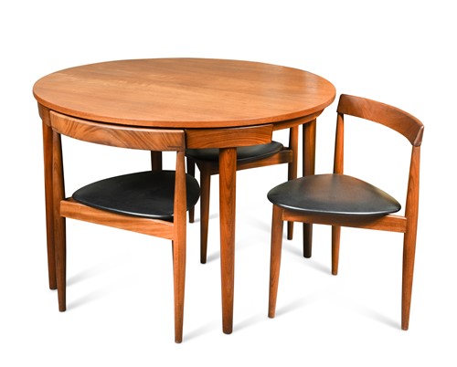 Lot 192 - Hans Olsen for Frem Rojle, A Danish teak dining table and four hideaway chairs, circa 1965