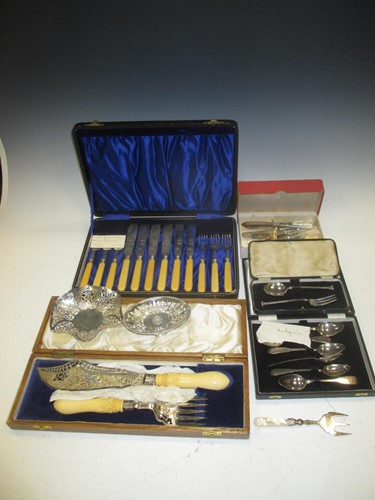 Lot 453 - A collection of silver flatware, napkin rings...
