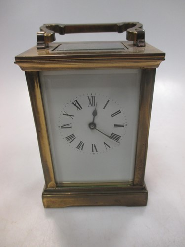 Lot 44 - A French brass carriage timepiece