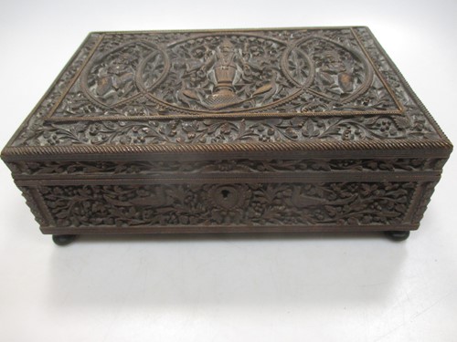 Lot 282 - An Indian/Asian carved wood box, probably...