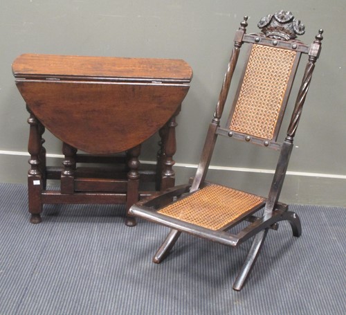 Lot 497 - An oak gateleg occasional table together with...