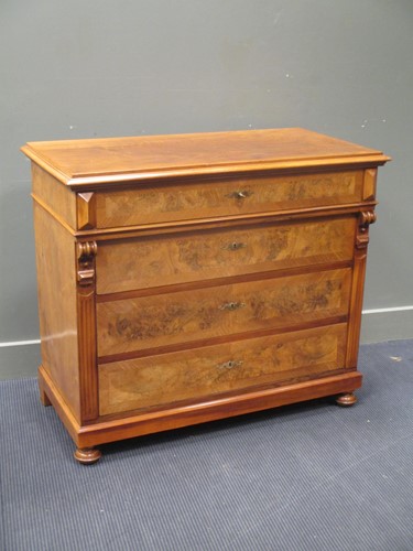 Lot 597 - A French walnut four drawer chest with key 94...
