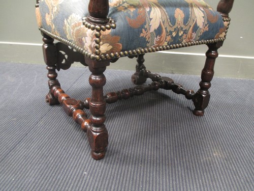 Lot 820 - An early 19th century carved walnut upright...