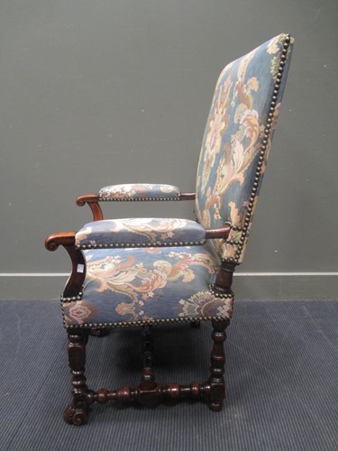 Lot 820 - An early 19th century carved walnut upright...