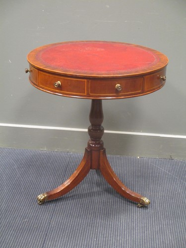 Lot 484 - A Georgian style mahogany revolving drum top...
