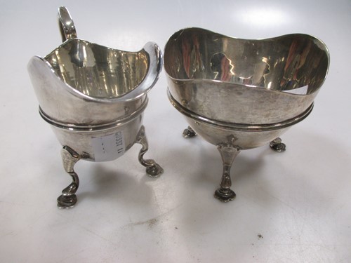 Lot 422 - An early 20th century silver jug and sugar...
