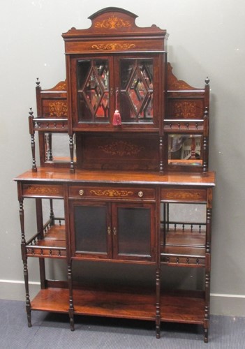 Lot 807 - A Victorian inlaid rosewood four door bevel...