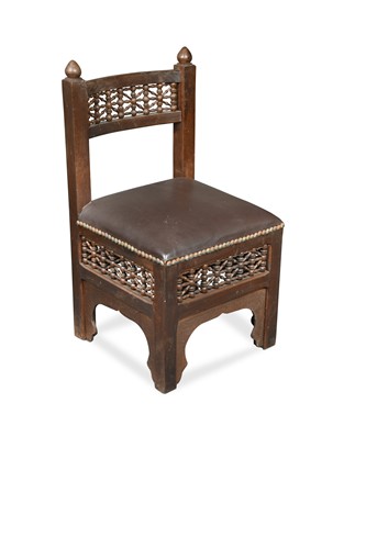 Lot 137 - Attributed to Liberty & Co., an Arts & Crafts Moorish style side chair