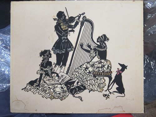 Lot 415 - A pair of cut paper silhouettes depicting...