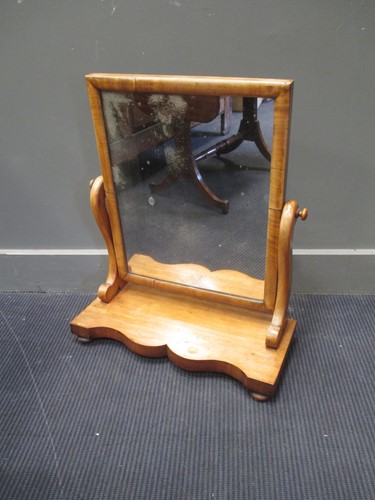 Lot 718 - A dressing table mirror 54cm wide together...