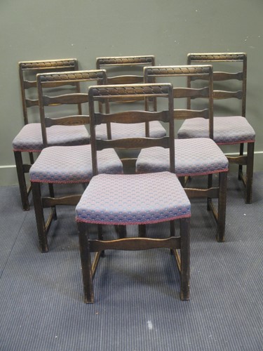 Lot 826 - A set of six oak ladder back dining chairs (6)
