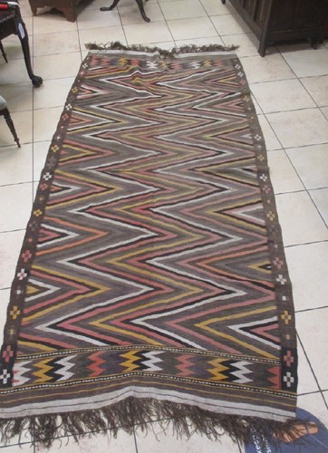Lot 897 - A tribal rug with coloured chevron pattern
