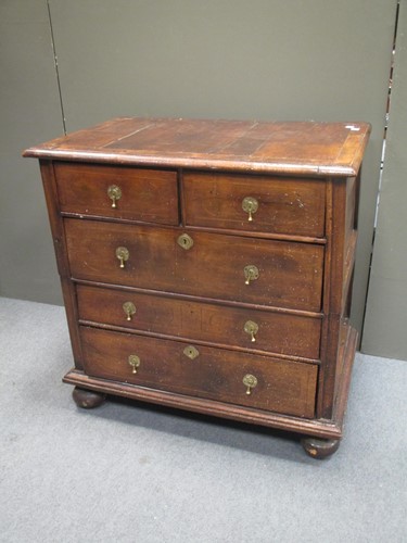 Lot 840 - An 18th century walnut chest, possibly...