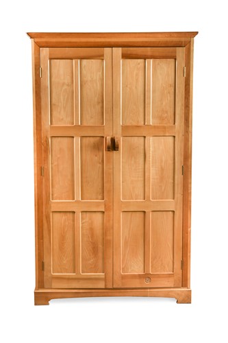 Lot 181 - A Yorkshire School sycamore wardrobe in the manner of Peter Waals