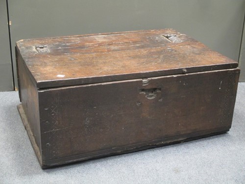 Lot 843 - A 17th century and later oak box with hinged...