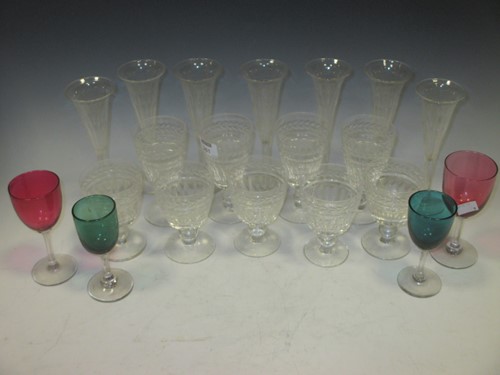 Lot 261 - A set of seven glass flutes, two pairs of...