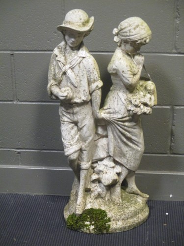 Lot 895 - A garden figure of a courting couple, 88.5cm high